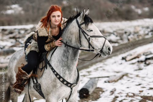 Viking girl on horseback