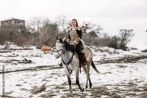 Viking girl on horseback © boykovi1991