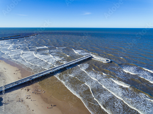 Pier at the beach, view from above photo