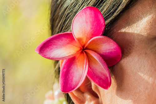 Pink  frangipani flowers Tuck ear women.