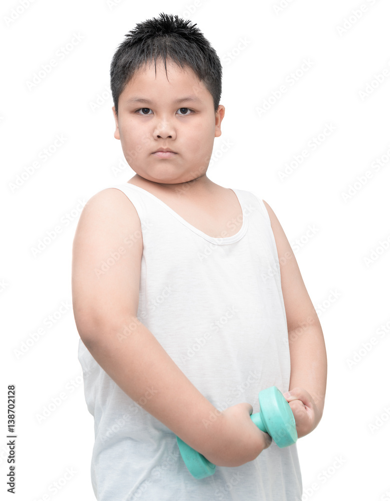 handsome obese boy is doing exercises with dumbbells