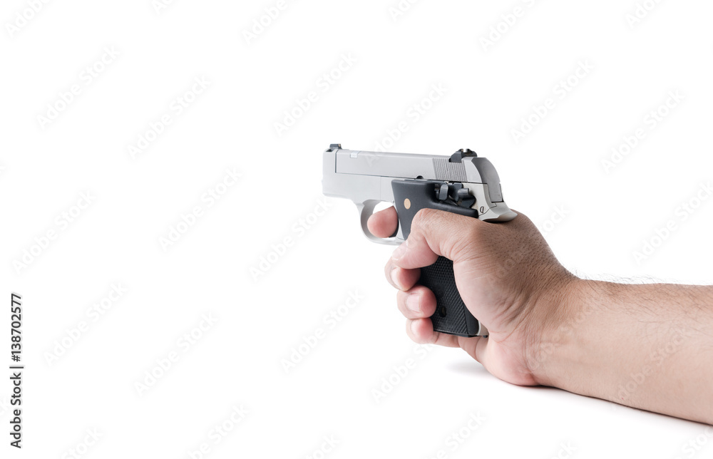 small automatic gun in hand man isolated