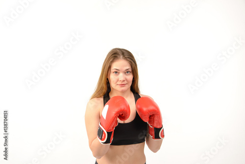 Young fitness woman with boxing gloves © Alexey Seafarer