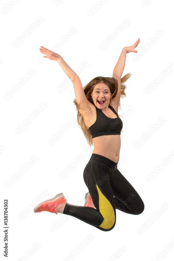 Youn fitness woman jumping isolated on white