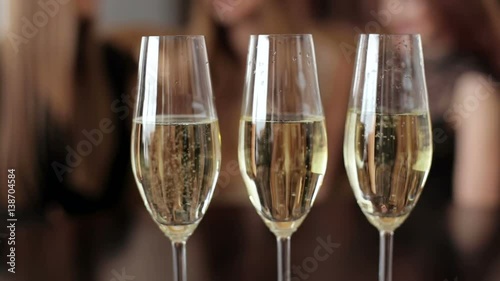 Wallpaper Mural Three glasses of champagne on blurred background. Torontodigital.ca