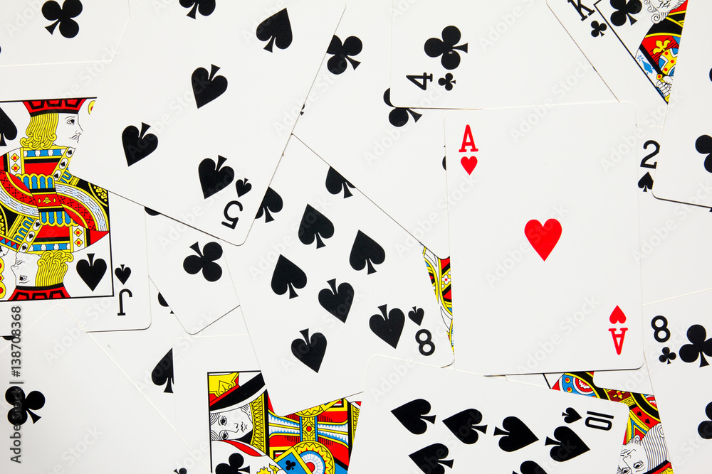 Red heart card difference on black spade and club poker background Red heart card difference on black spade and club poker background