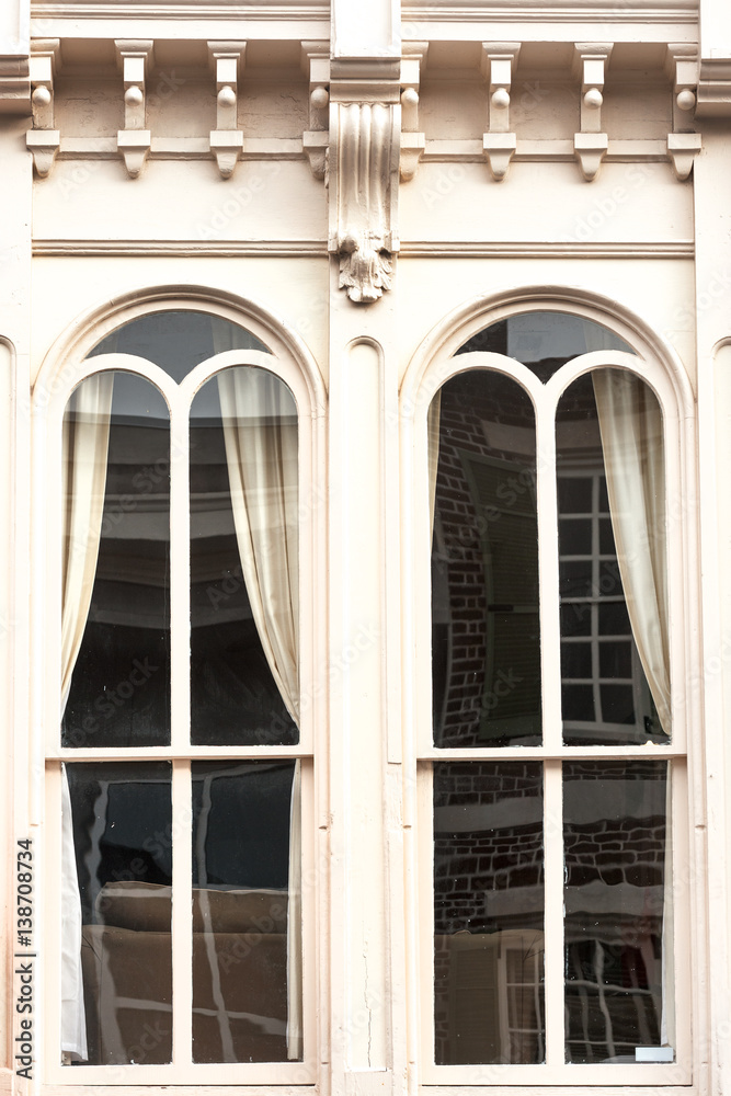 Windows of King street colonial house, downtown Charleston, SC
