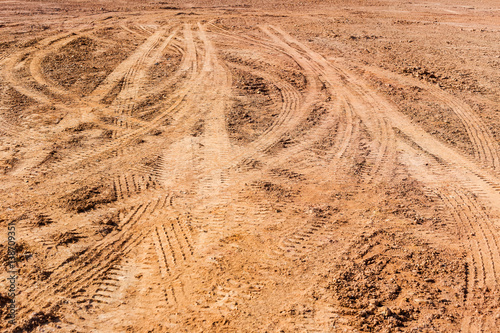Tired track on the ground.