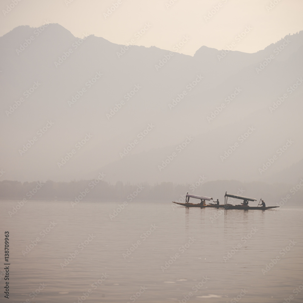 Lifestyle in Dal lake, local people use 'Shikara', a small boat for transportation in the lake of Srinagar, Jammu and Kashmir state, India.