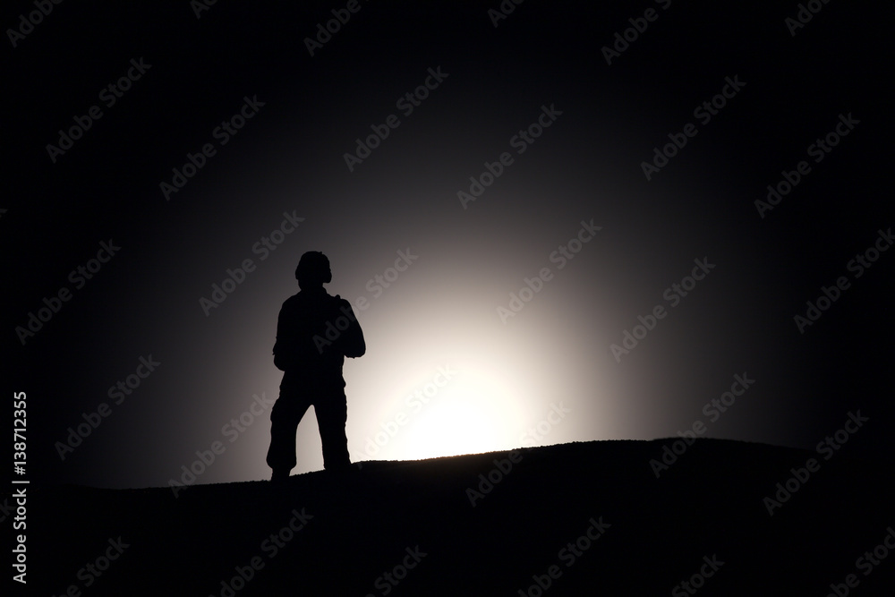 Silhouette Of A Soldier on a dark background