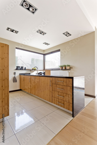 Bright kitchen with wooden furniture