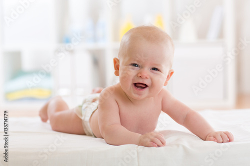 Newborn baby wearing diaper...