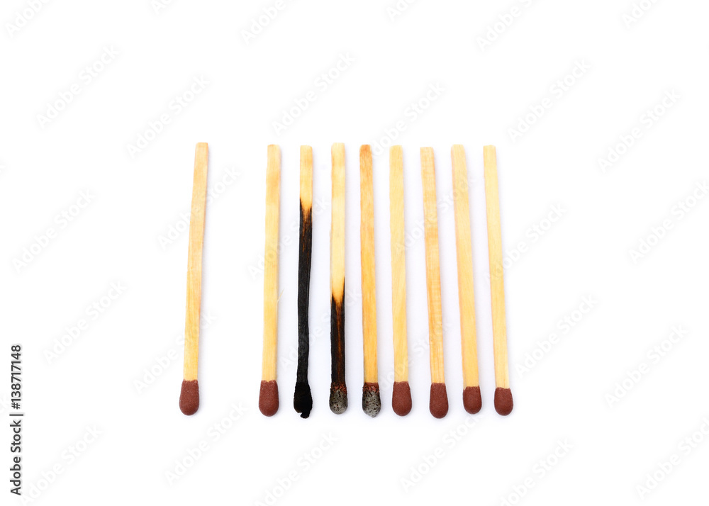 Laid used matchsticks isolated on white background Laid used matchsticks isolated on white background