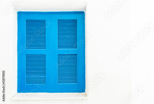 blue window with white wall