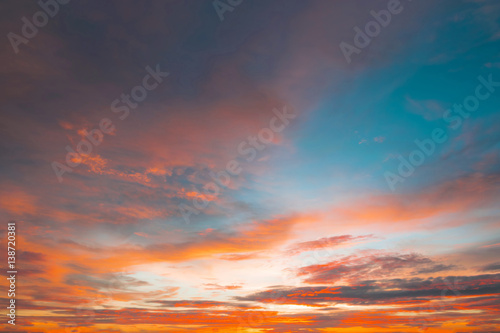 Beautiful color sunset sky for background web design or backdrop design, Sky, Bright Blue, Orange And Yellow Colors Sunset. Instant Photo, Toned Image and color sunset sky