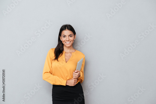 Business woman holding tablet computer photo