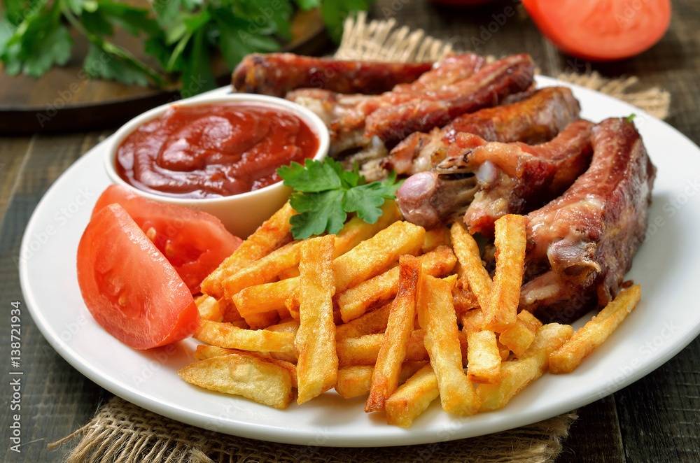 Potato fries and pork ribs