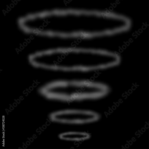 Smoke circles on black background