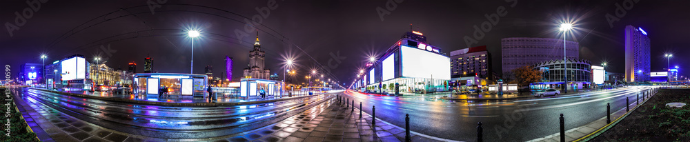 Night skyline of Warsaw with soviet era Palace of Culture and science. 360 degree panoramic montage from 20 images - obrazy, fototapety, plakaty 