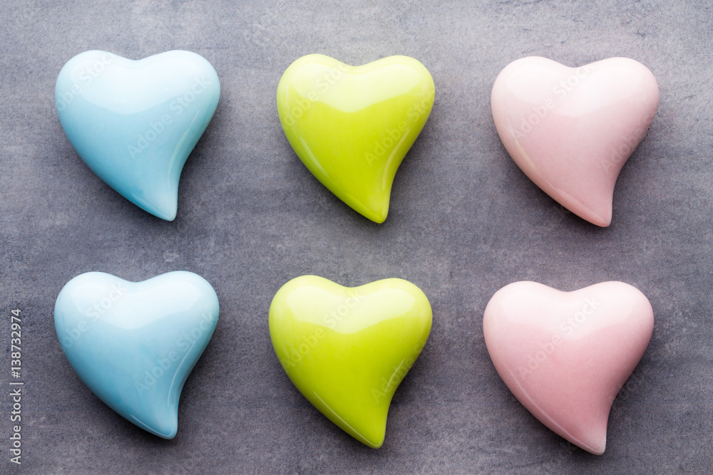 Colored heart on the gray background.