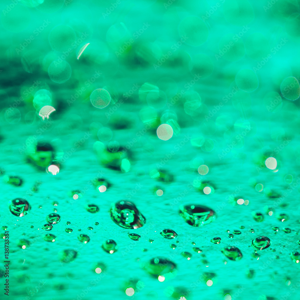 abstract green background with water drops, shallow depth of field