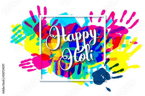 Happy holi on a background of hand prints