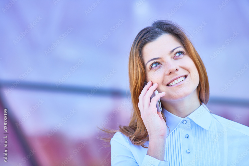 business woman with a phone in the street business woman with a phone in the street
