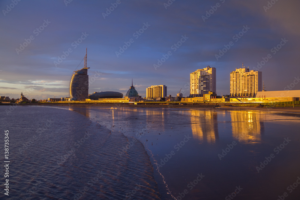Bremerhaven. Waterfront with skyline after a rainstorm at sunset.