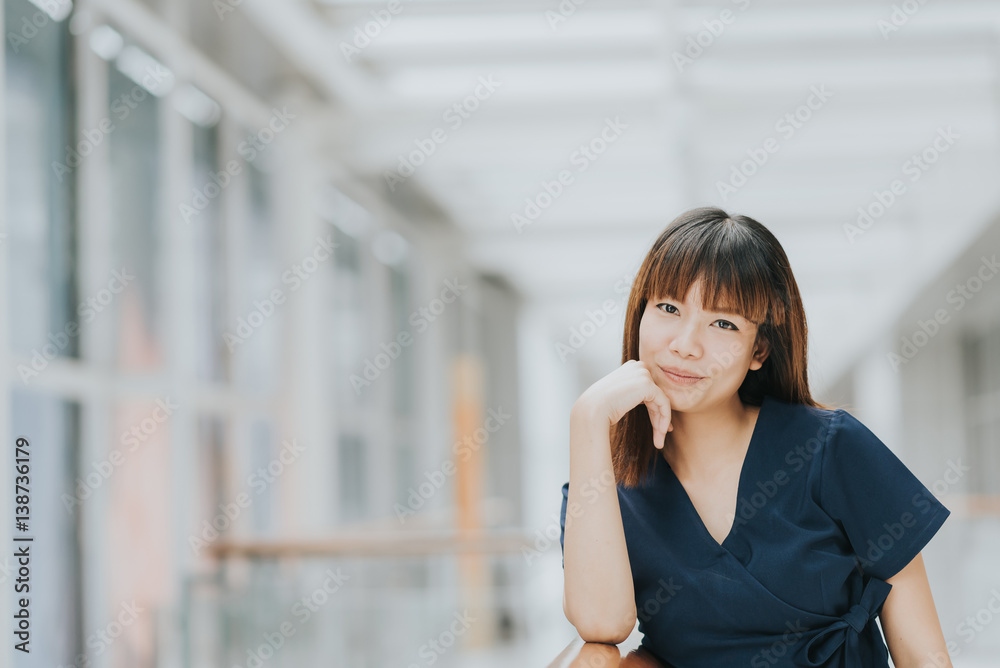 Portrait of beautiful young happy Asian girl smiling indoor Portrait of beautiful young happy Asian girl smiling indoor