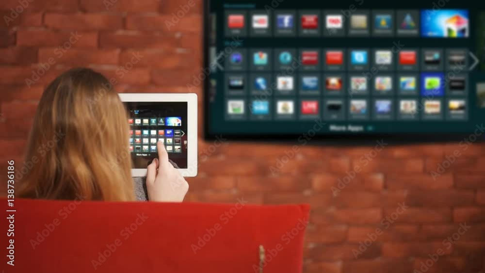 Closeup of a tablet is connected to a smart TV.