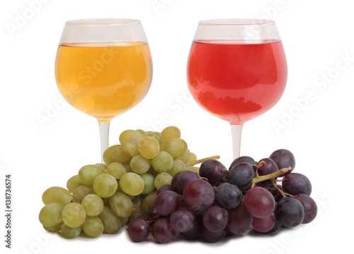 Bottle glass of wine and grapes on white background