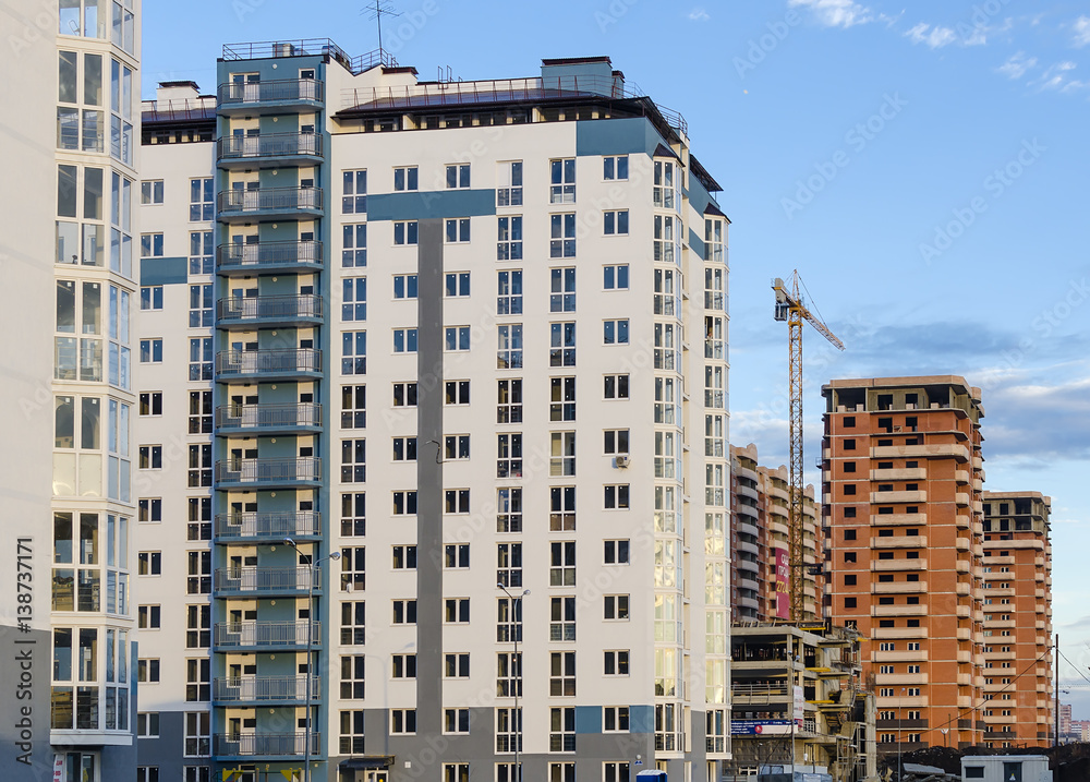 The complex of high-rise buildings of different colors