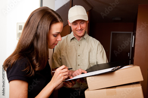 Delivery Boy Handing Over Some Packets