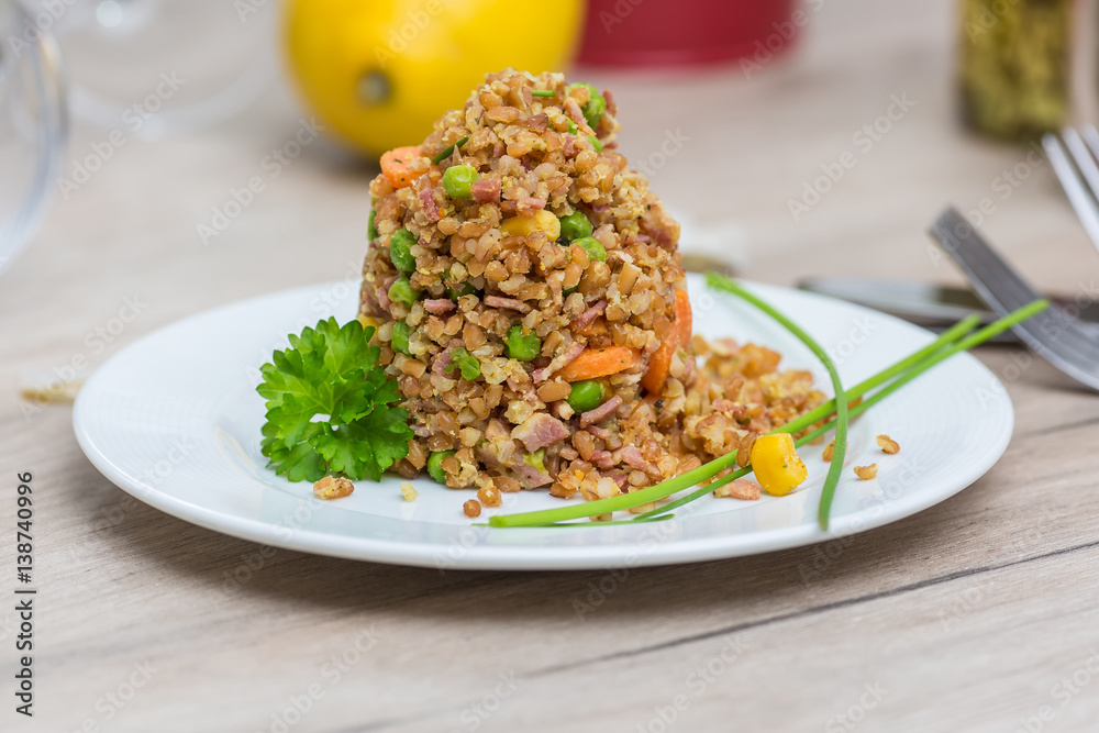 Bulgur vegetable salad on wooden table Bulgur vegetable salad on wooden table