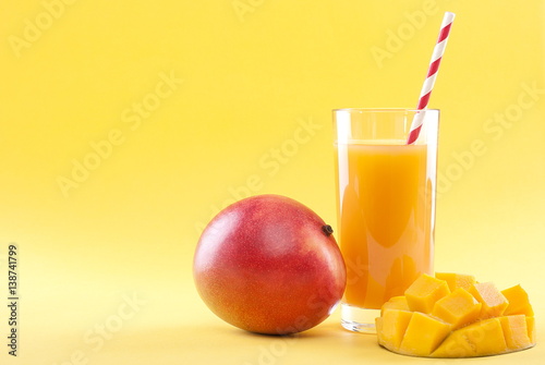 mango juice isolated on a yellow background