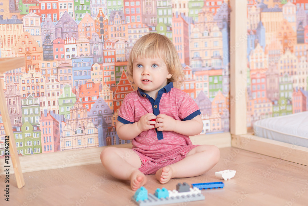 Little boy playing with lots of colorful plastic blocks constructor indoor. Little boy playing with lots of colorful plastic blocks constructor indoor.