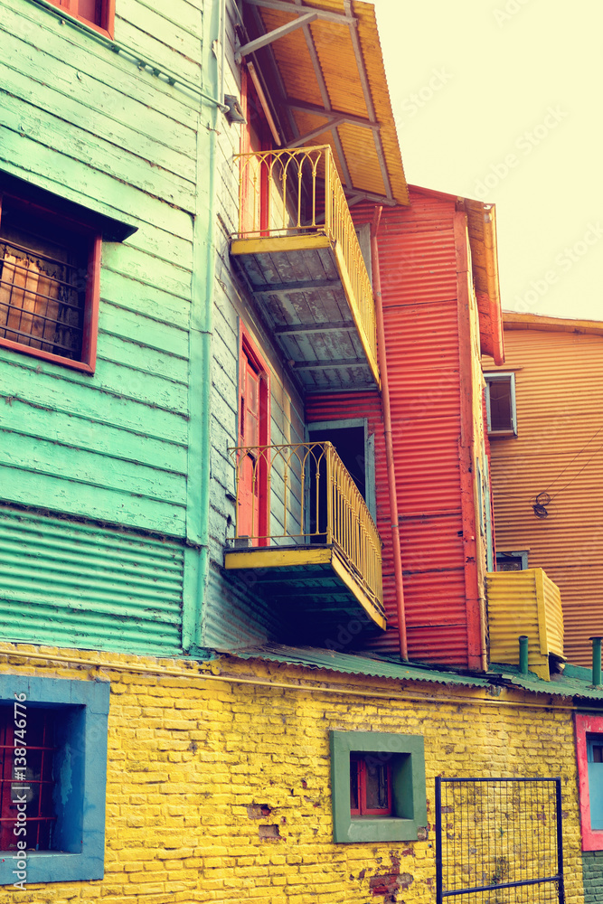 Streets of La Boca in Buenos Aires, Argentina with number of colorful houses and tango teachers.