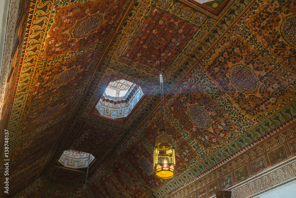 Colorful oriental Ceiling fragment inside the Bahia palace
