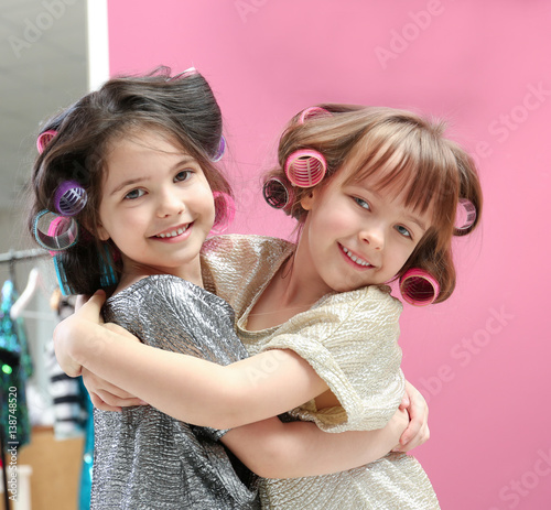 Cute little girls playing w...