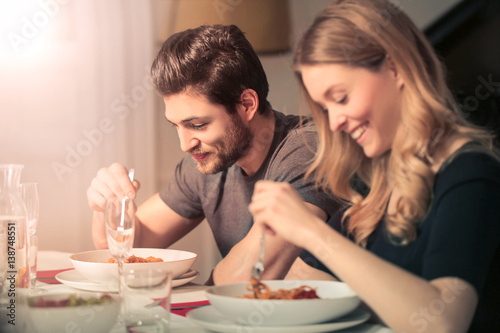 Cute couple eating dinner