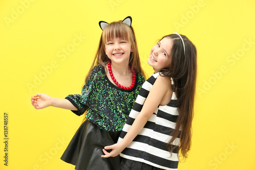 Cute little girls having fu...