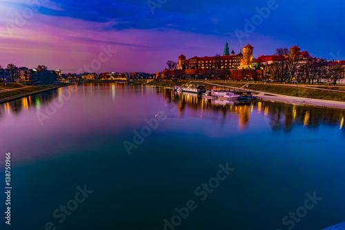 Royal castle of the Polish kings on the Wawel hill  over the Vistula river in the evening  Krakow  Poland