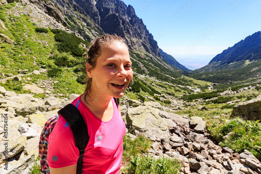 Girl hiking to the Teryho Chata in the Slovakian mountains