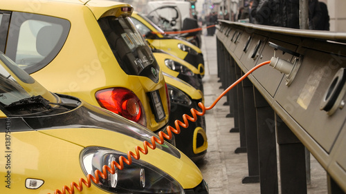 Power supply for electric car charging. City electric car charging station. Close-up.
