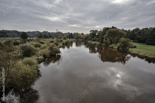 Trees and shrubs on the banks of the River Neisse in Poland. © GKor