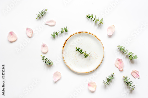 light breakfast disign with flowers on white table top view mock up