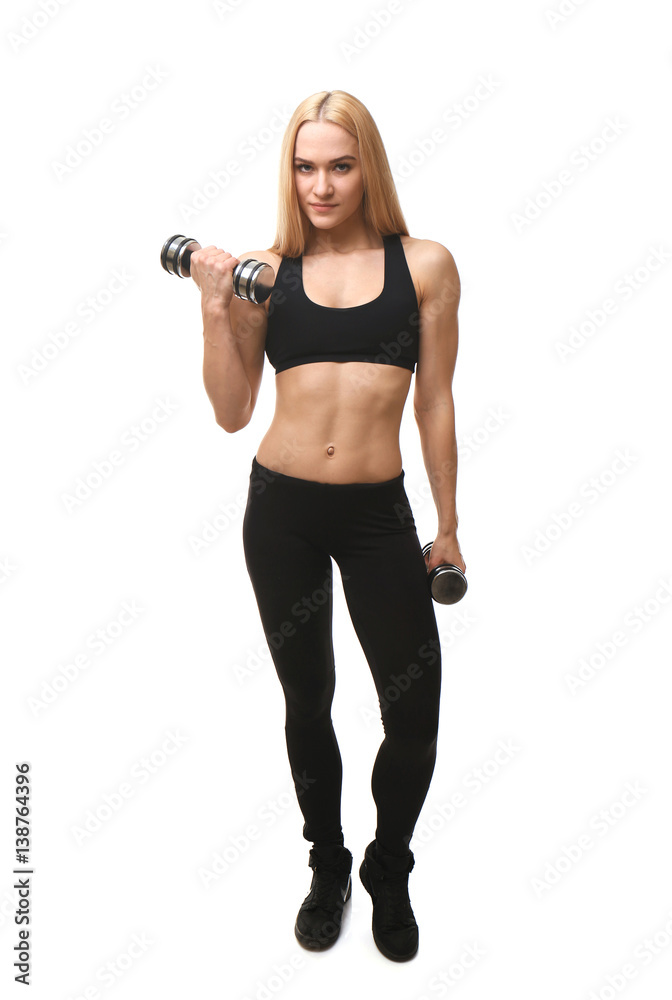 Young athletic woman with dumbbells isolated on white Young athletic woman with dumbbells isolated on white