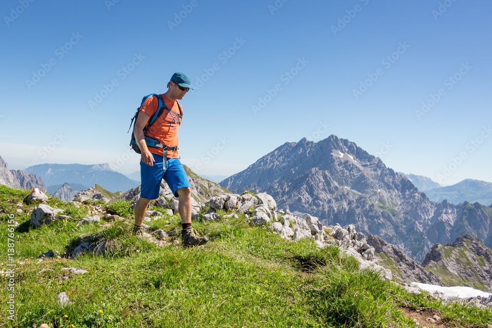 Mountaineer hiking in the alps