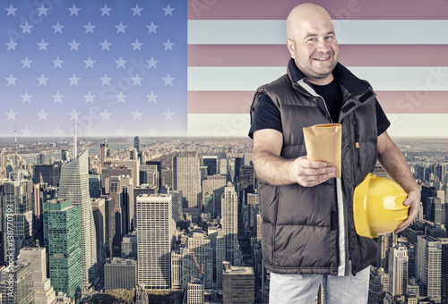 Photography Construction worker, New York city in background.