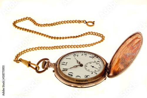 Vintage antique pocket watch with chain.